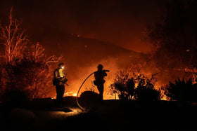 Archival photograph of firefighters at the earlier Franklin Fire in Malibu in 2024; not the October 2026 Bryson Fire