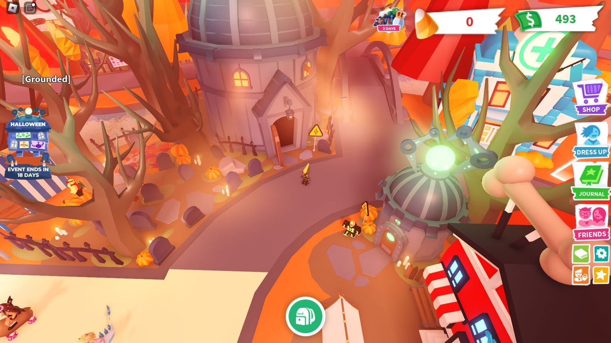 Adopt Me Halloween event hub with pumpkins, haunted buildings and an orange autumn atmosphere