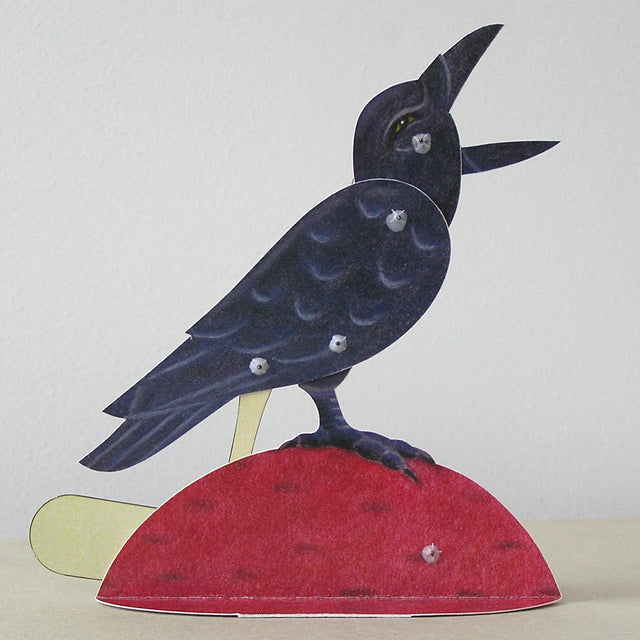 Bliss Kolb’s handmade paper crow automaton, illustrating the Seattle artist’s mechanical artwork discussed in the Kelly Clarkson bird dispute