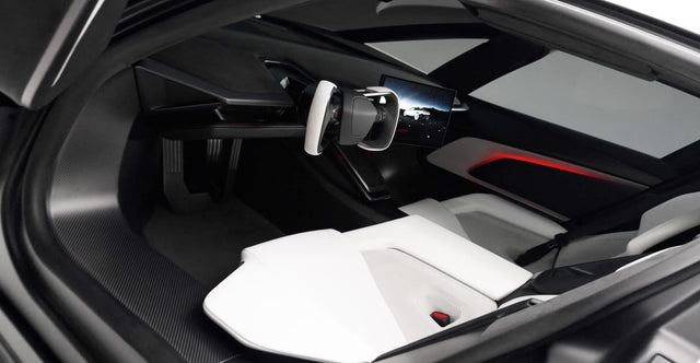 Interior of the redesigned Tesla Roadster with yoke steering and central display