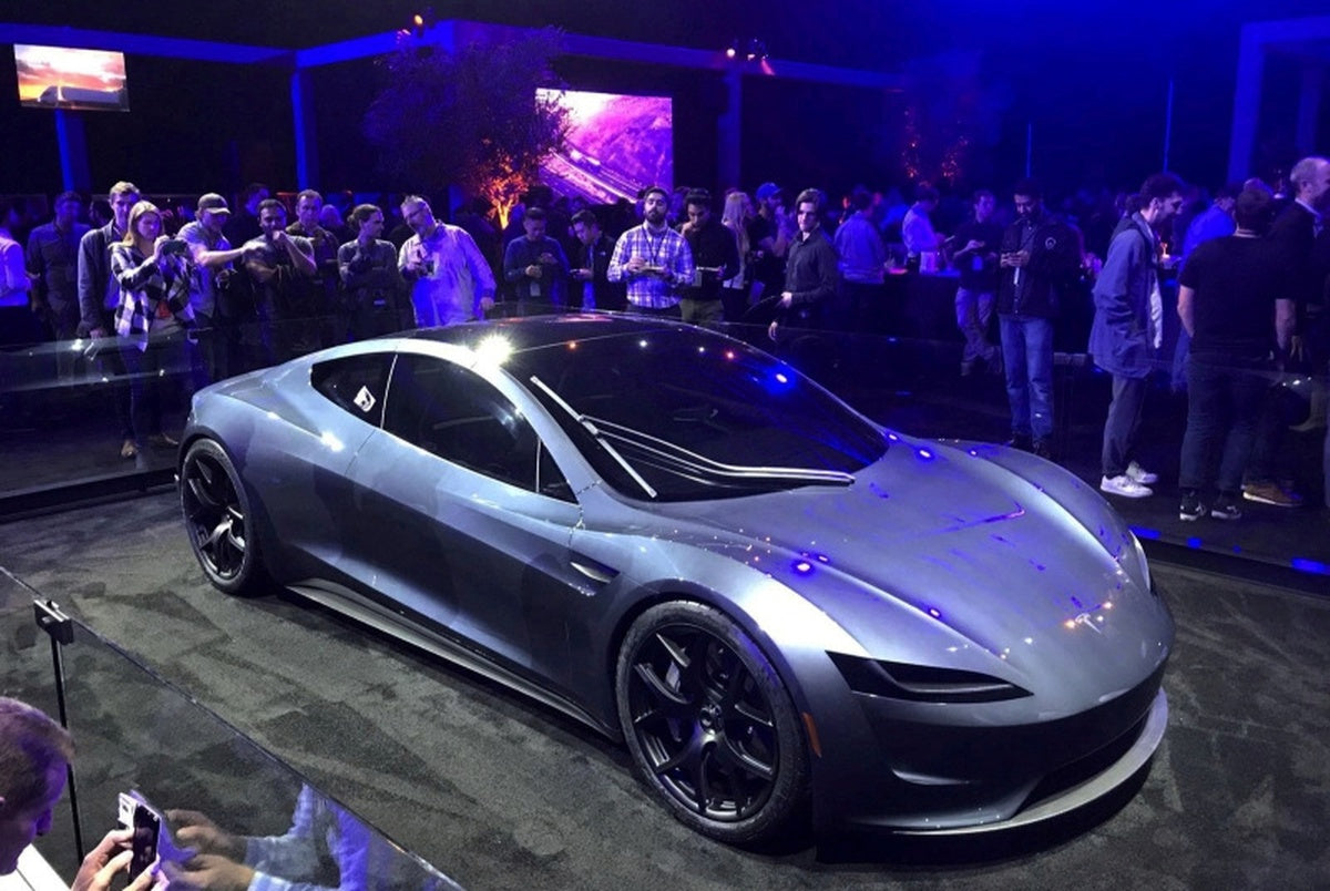 Tesla Roadster prototype displayed at an earlier reveal event; historical image, not the October 2026 flying demonstration