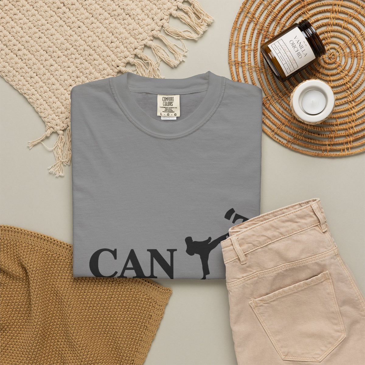 T-Shirt — 'CAN'T' Motivational Graphic Tee (Silhouette Kicking Apostrophe)
